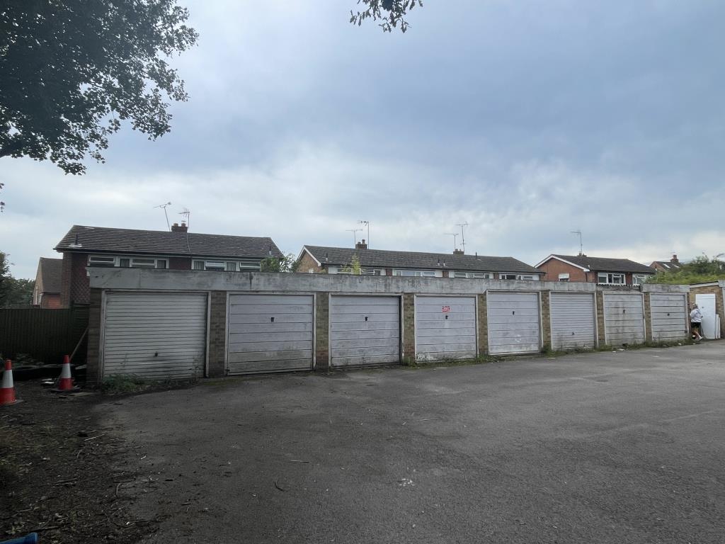 Lot: 84 - LAND AND GARAGES WITH POTENTIAL FOR DEVELOPMENT - view of northern block of eight garages